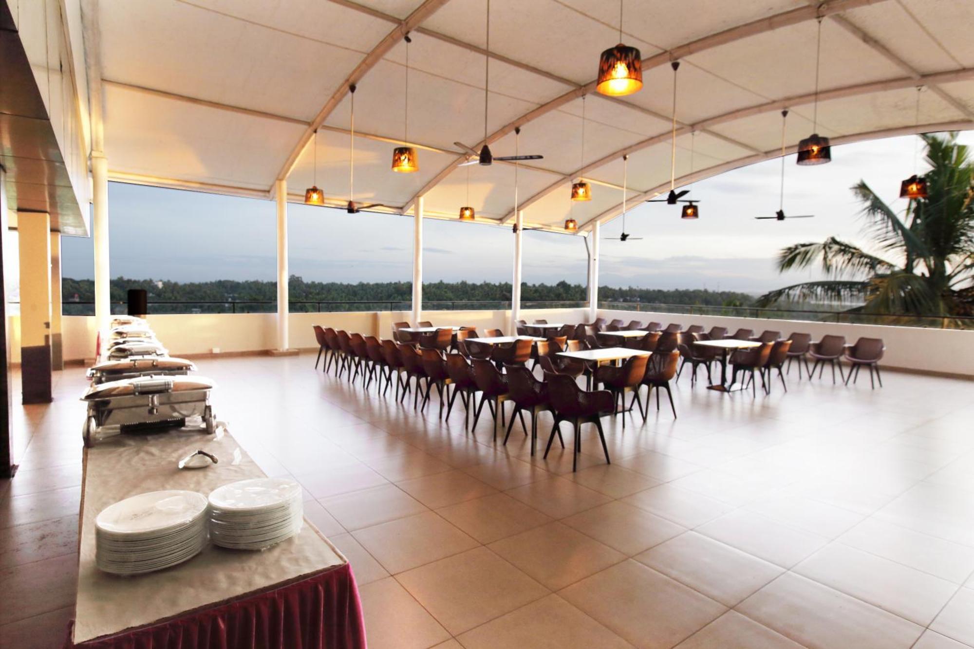 Magnet Hotel Kannur Buitenkant foto