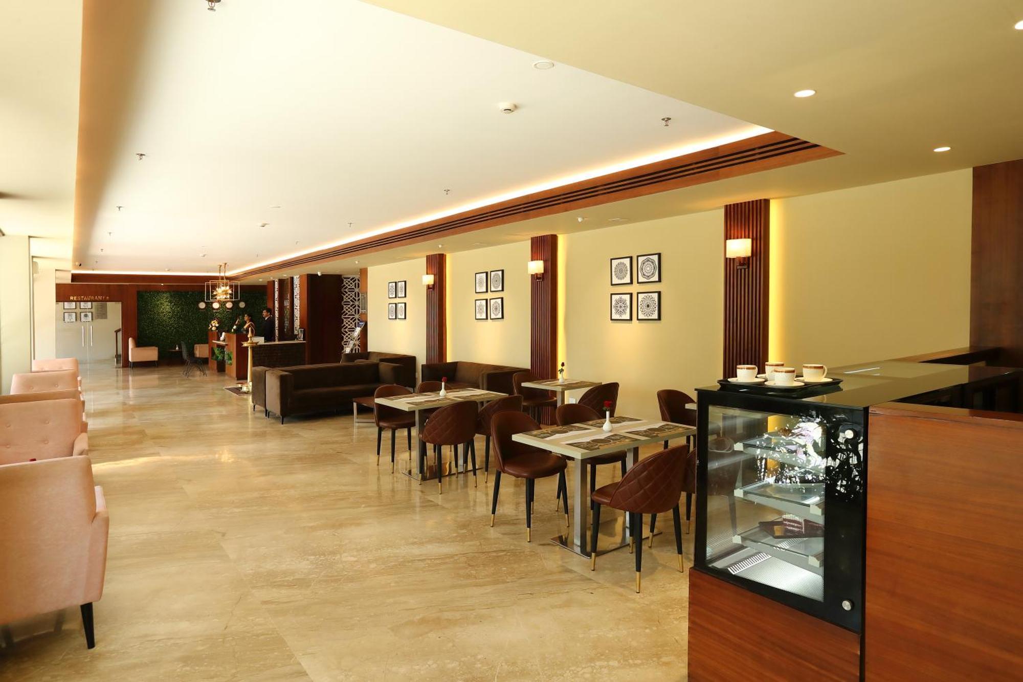 Magnet Hotel Kannur Buitenkant foto